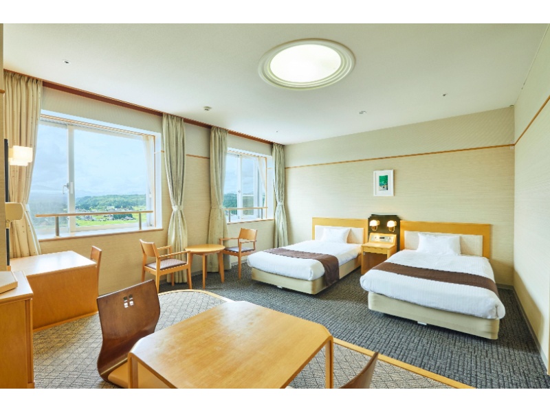 【洋室ツイン】３名様まで収容可能な洋室ツインルーム。